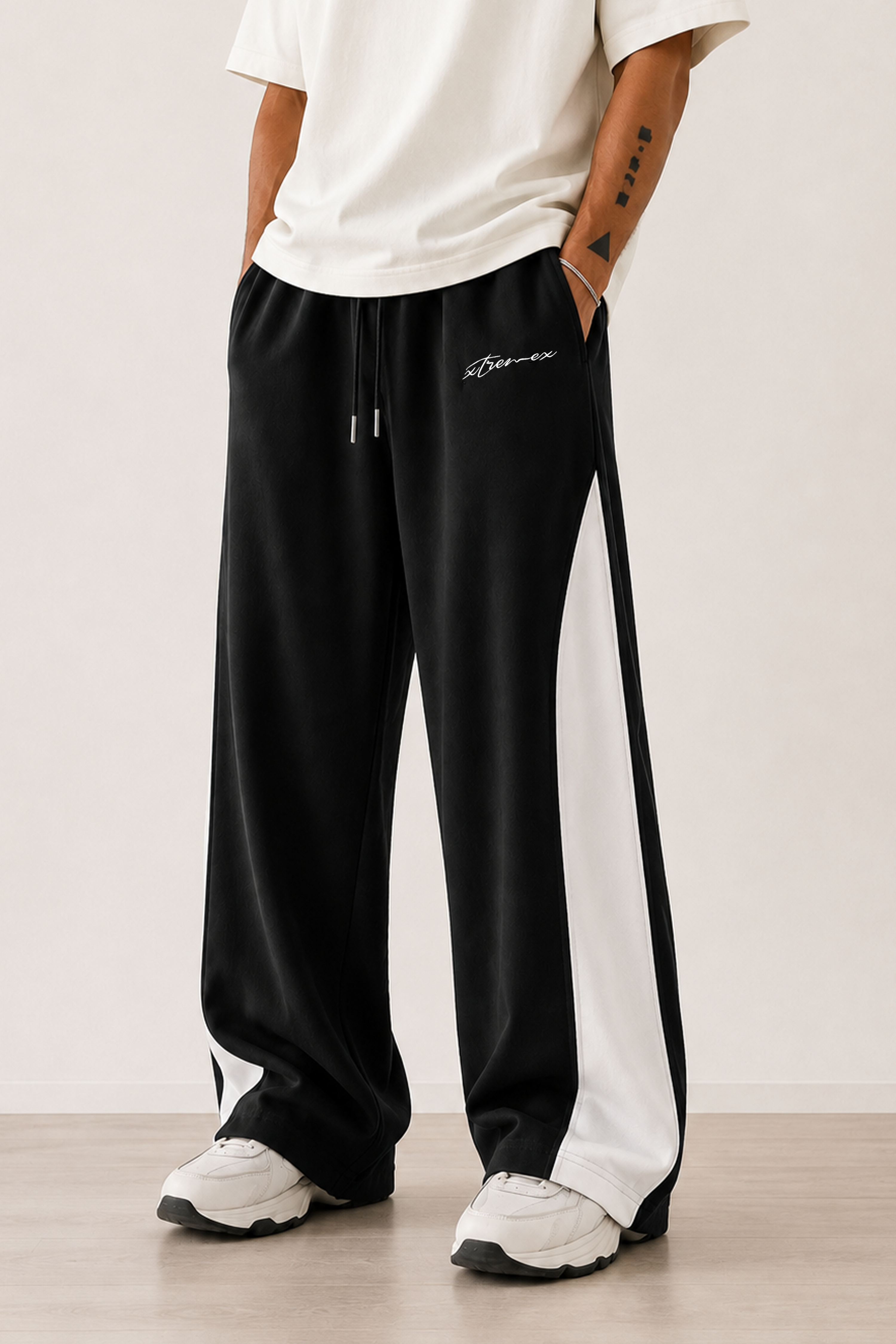 Image of Black joggers featuring contrast side panel design