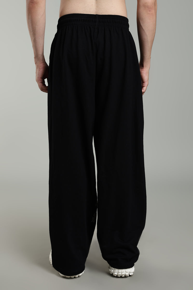 Black joggers with ghost flame graphic design