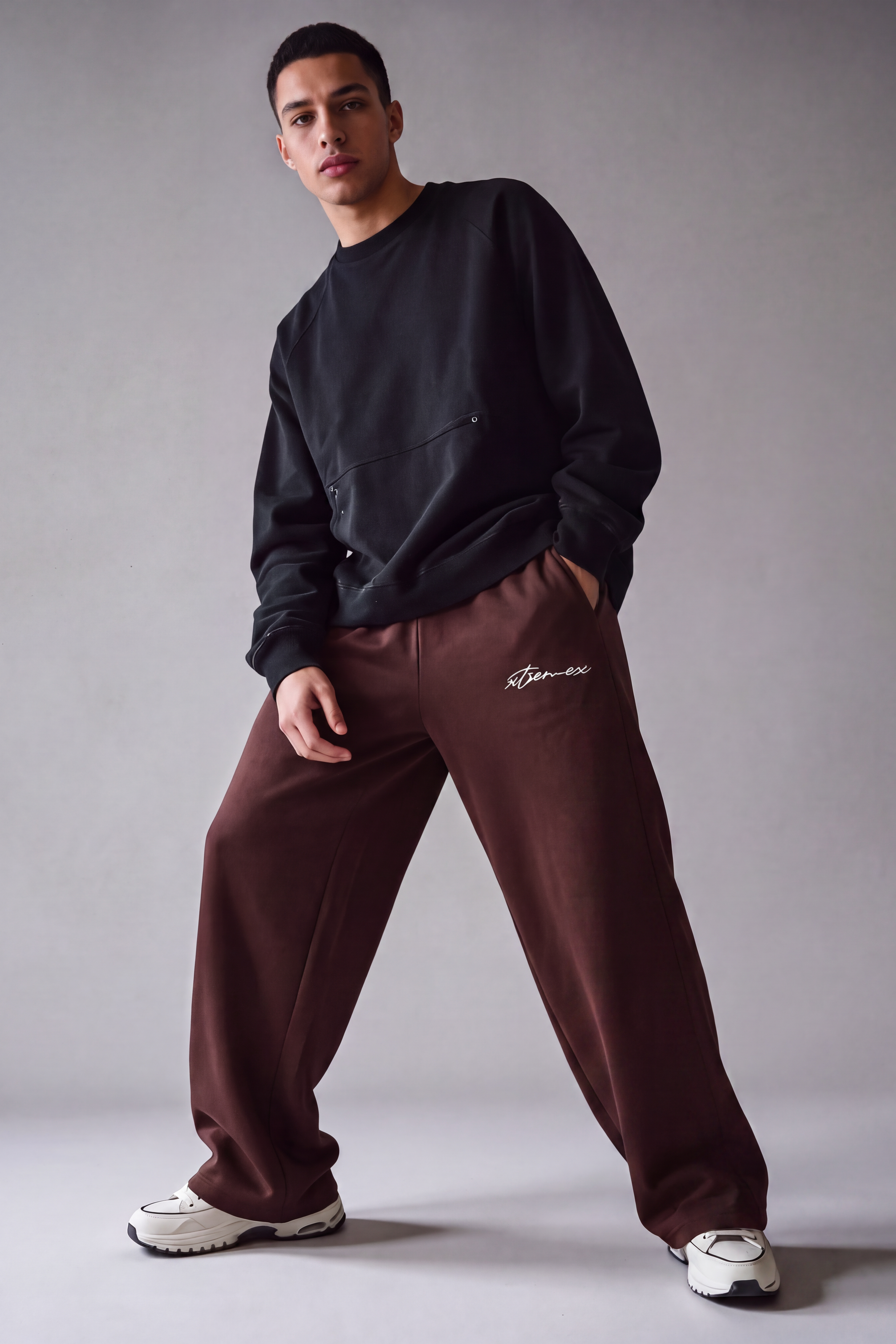 Image of Brown unisex joggers with loose fit and pockets