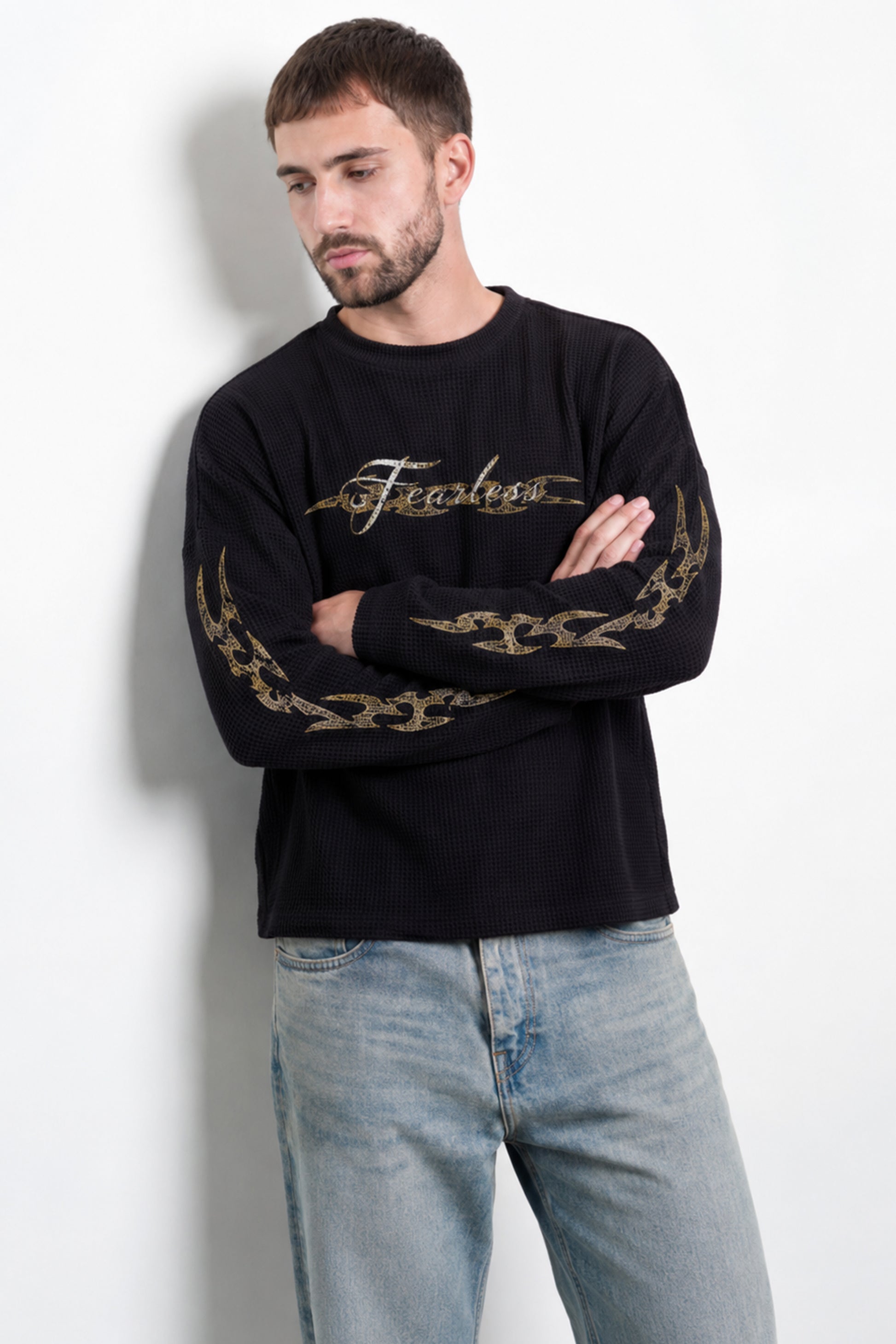Men's Fearless Waffle Tshirt Black featuring chest logo and sleeve graphics
