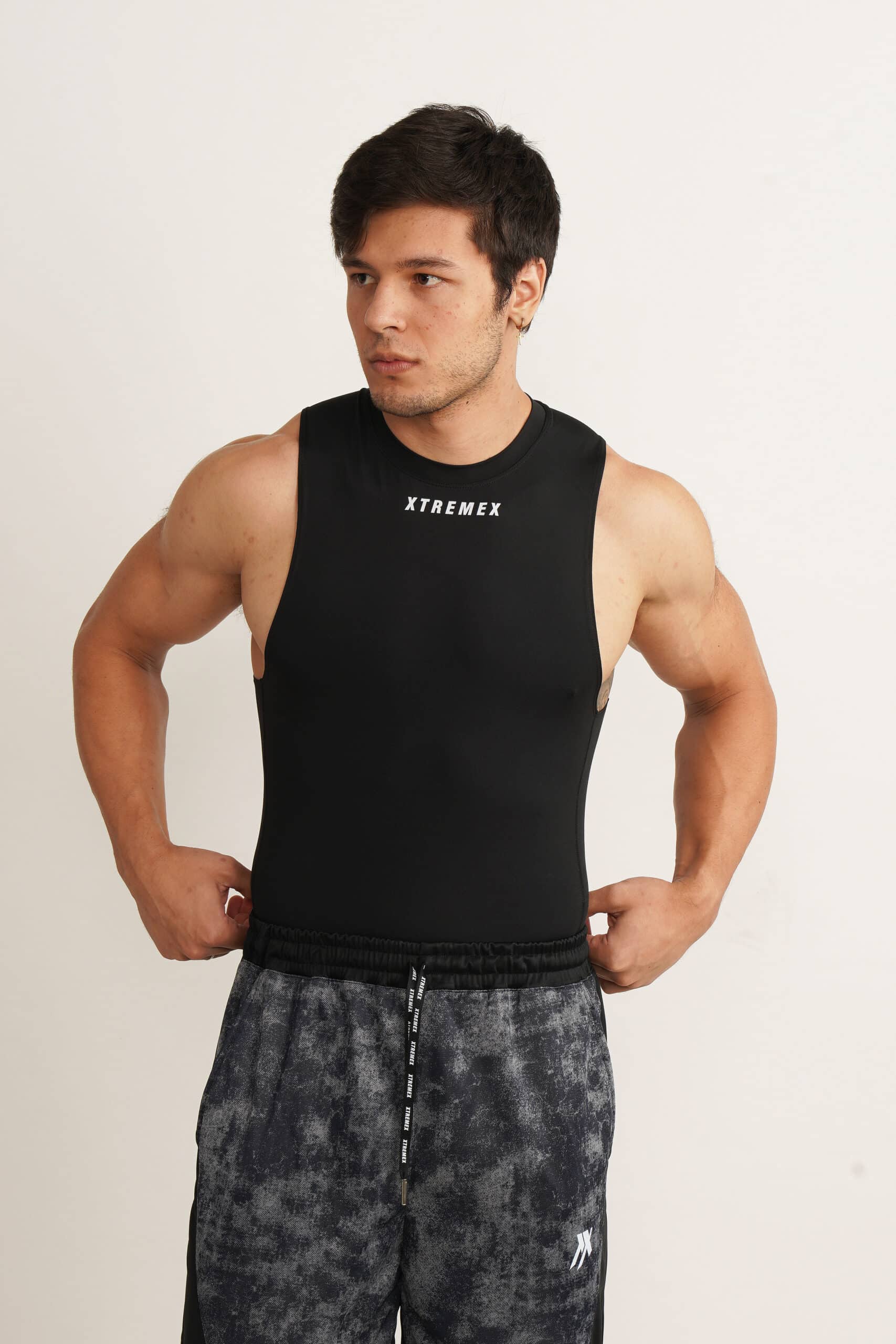 Image of Sleeveless Drop Arm Compression Tshirt