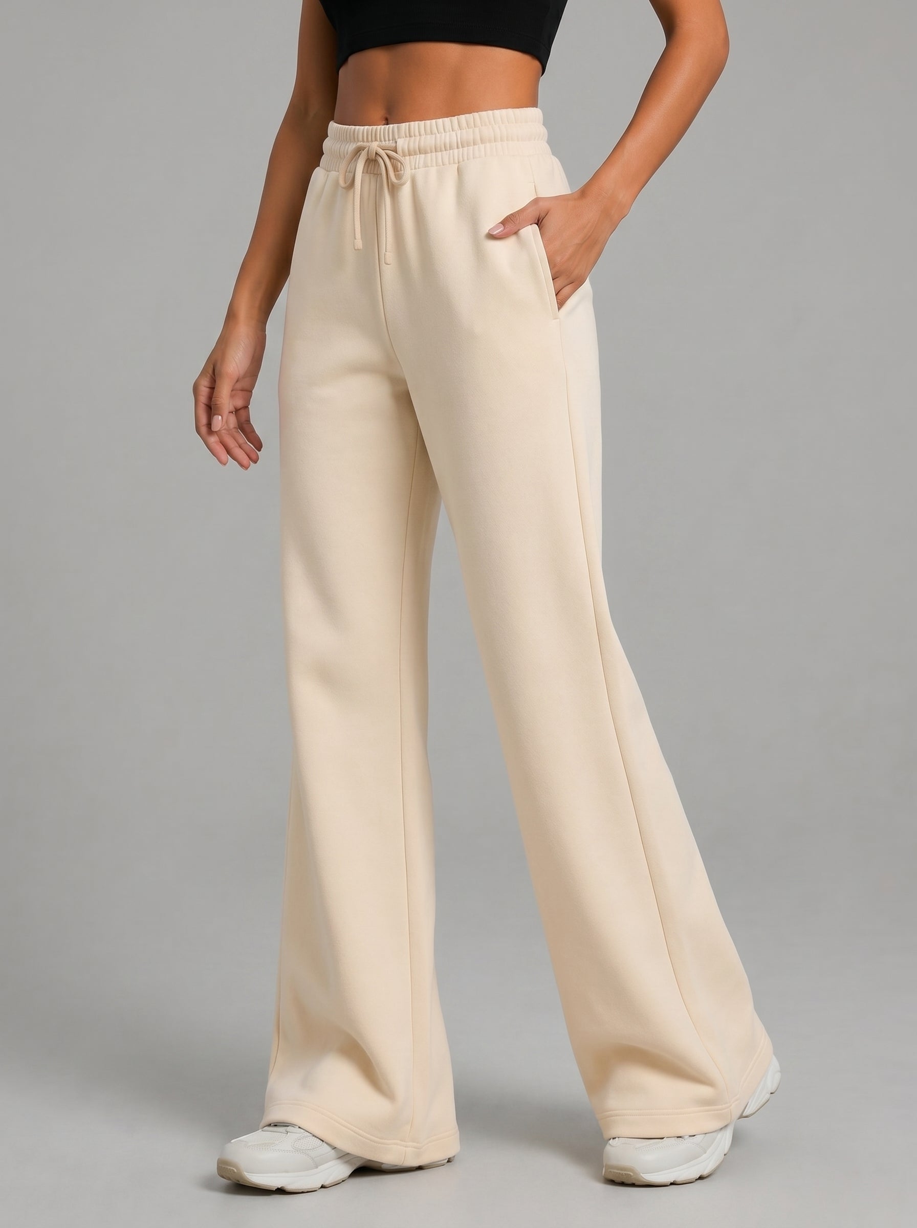 Women's beige flared activewear pants with soft stretch fabric